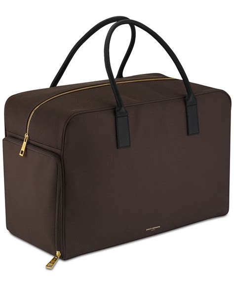 Receive a complimentary weekender bag with any large spray